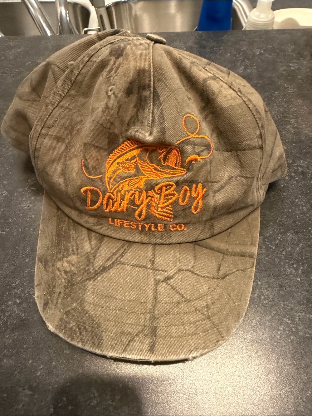 Dirtly Boy Brown Cotton Baseball Cap with Orange Logo